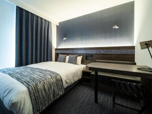 Goto Tsubaki Hotelにあるベッド