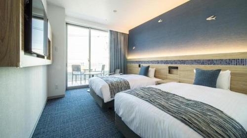 Goto Tsubaki Hotelにあるベッド
