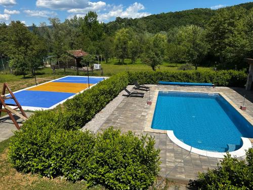 an image of a swimming pool in a yard at Holiday Home Faruk in Račić