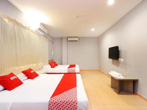 Katil atau katil-katil dalam bilik di OYO 89676 Hotel 22