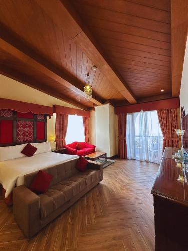 Ένα ή περισσότερα κρεβάτια σε δωμάτιο στο Pearl Continental Hotel Malam Jabba