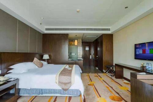 Televisyen dan/atau pusat hiburan di Santavan Hotel Shenzhen Guangming