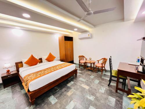 Ένα ή περισσότερα κρεβάτια σε δωμάτιο στο Hotel Green Galaxy - Green Park South Delhi