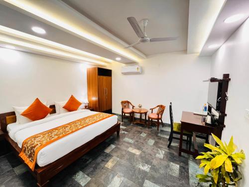 Ένα ή περισσότερα κρεβάτια σε δωμάτιο στο Hotel Green Galaxy - Green Park South Delhi