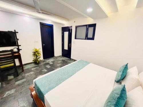Ένα ή περισσότερα κρεβάτια σε δωμάτιο στο Hotel Green Galaxy - Green Park South Delhi