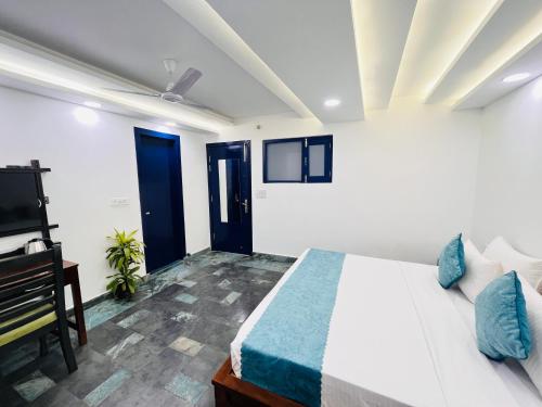 Ένα ή περισσότερα κρεβάτια σε δωμάτιο στο Hotel Green Galaxy - Green Park South Delhi