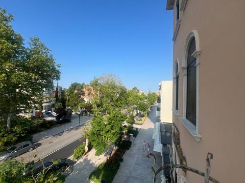 a view of a street from a balcony of a building at Hotel Cristallo in Venice-Lido