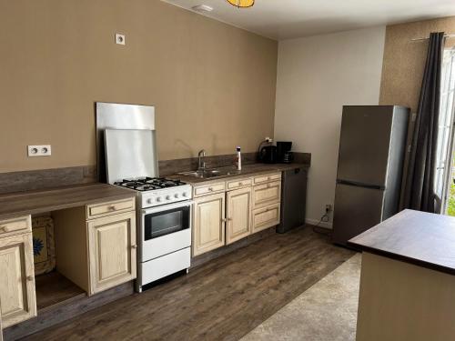 Η κουζίνα ή μικρή κουζίνα στο Les Maisons Pitchoune & Pitchounette