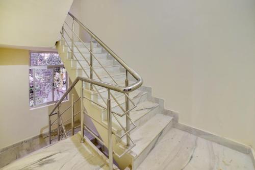 Fotografie z fotogalerie ubytování Hotel O AA Corporate Guest House v destinaci Ráňčí
