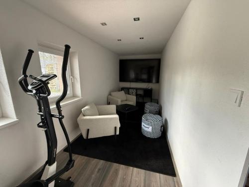 a view of a living room with a camera at Chalupy Severní in Lobendava