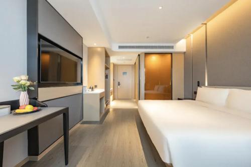 Katil atau katil-katil dalam bilik di Atour Hotel Shanghai Pudong Airport Chuansha Station