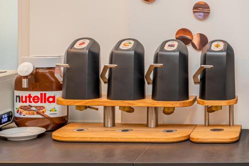 a display of four hot dogs on a shelf at Hotel Gute Hoffnung Pforzheim in Pforzheim