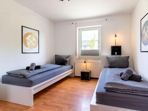 Ένα ή περισσότερα κρεβάτια σε δωμάτιο στο Nice Apartment Herten