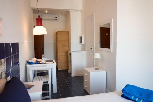 Kuchyň nebo kuchyňský kout v ubytování Residenza Punta Stendardo