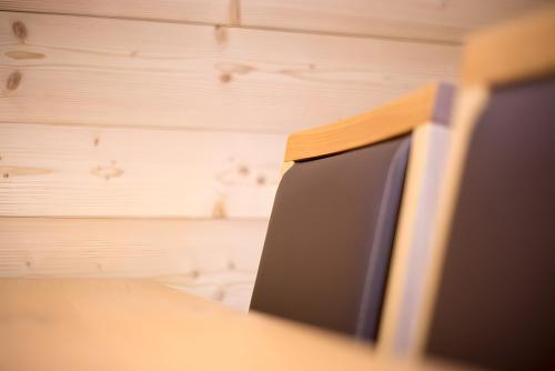 a computer monitor sitting on top of a desk at Appartement Moosmann in Mellau