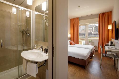 Koupelna v ubytování Grand Hotel Fleming by OMNIA hotels