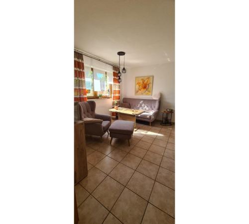 Χώρος καθιστικού στο Ferienwohnung Zum Plauderbaum