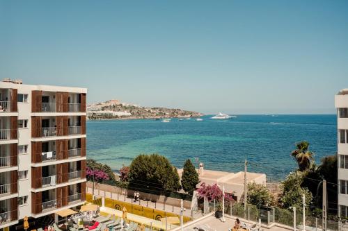 a view of the ocean from a building at Ryans Ibiza Apartments - Only Adults in Ibiza Town