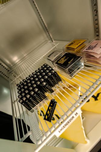 a shelf in a refrigerator filled with wine bottles at Ryans Ibiza Apartments - Only Adults in Ibiza Town