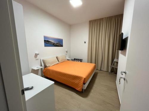 Giường trong phòng chung tại B&B IMMARE