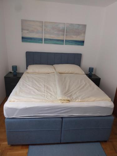 Posteľ alebo postele v izbe v ubytovaní Apartman Meerblick