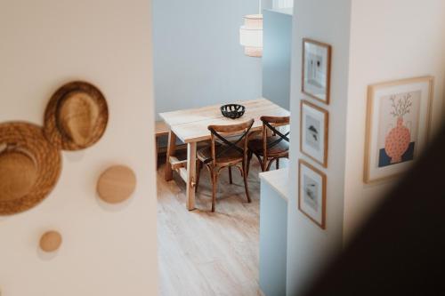 a dining room with a table and chairs at Spreewaldhaus Am Landgut Das Haupthaus in Markische Heide