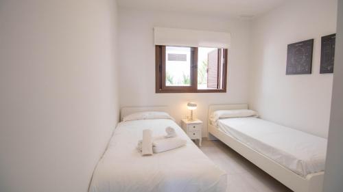 Postel nebo postele na pokoji v ubytování Casa Mesquida