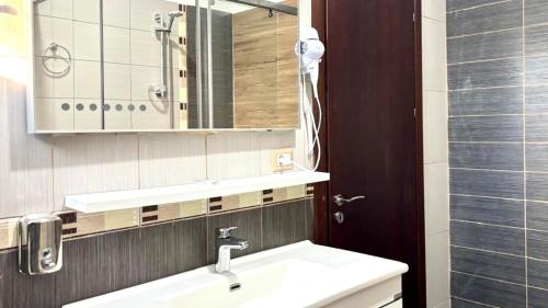 Koupelna v ubytování Triena Rooms