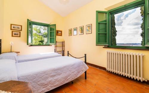 Postel nebo postele na pokoji v ubytování Agriturismo La Godiola