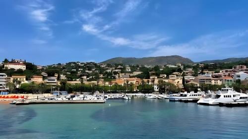a group of boats docked in a marina at Chez Lina in Le Lavandou
