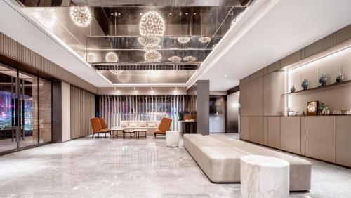 Xi'an Bell Tower Yongning Gate Orange Crystal Hotelにあるシーティングエリア