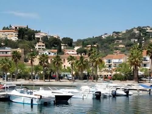 a group of boats docked in a marina at Chez Lina in Le Lavandou