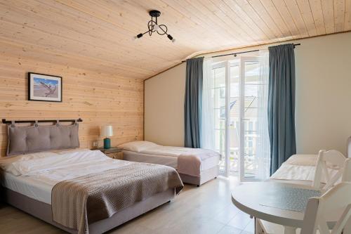 Postel nebo postele na pokoji v ubytování Willa Verano - Wyjątkowy Komfort Bardzo Blisko Plaży