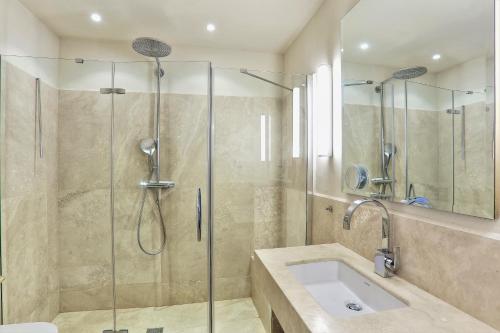 a bathroom with a shower and a sink at La Pergola in Castelfalfi