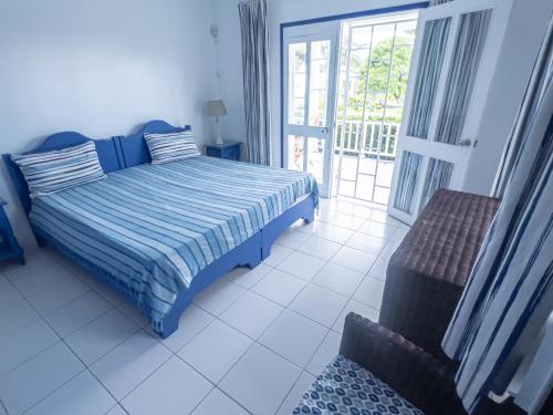 Postel nebo postele na pokoji v ubytování Beachfront Appartment
