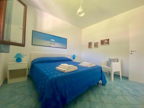 En eller flere senge i et værelse på Casa Vacanze Lido Burrone