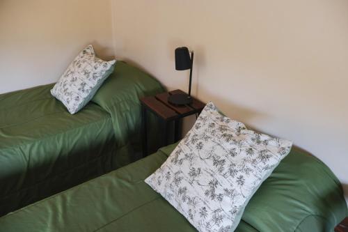 Letto o letti in una camera di Folk Hostel