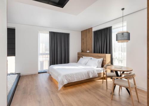 Postel nebo postele na pokoji v ubytování Lumen Living Apart