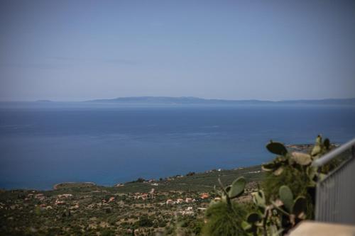 a view of a body of water from a hill at Rubeas Towers - Pyrgos Towers Complex in Pírgos