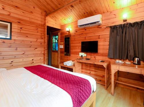 Televiisor ja/või meelelahutuskeskus majutusasutuses The Plix Resort