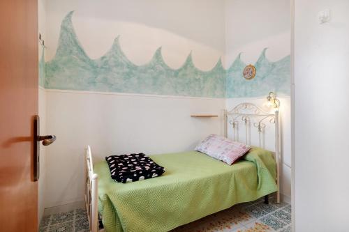 Postel nebo postele na pokoji v ubytování Casa Vacanza Da Licia