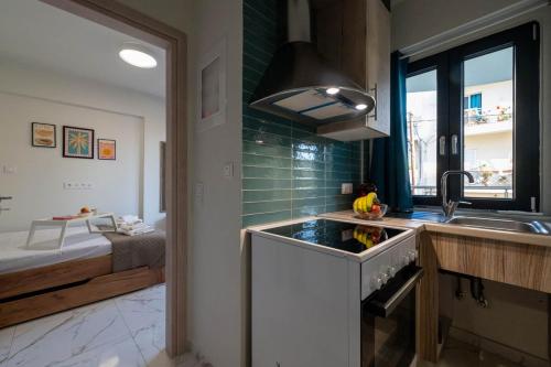 Η κουζίνα ή μικρή κουζίνα στο Pomegranate Apartments