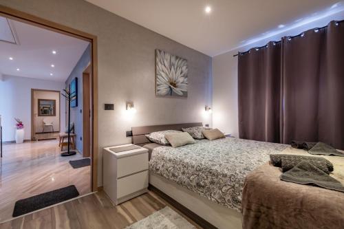 Postel nebo postele na pokoji v ubytování Villa Mia, your warm and sunny family getaway