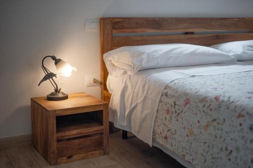 Ein Bett oder Betten in einem Zimmer der Unterkunft Albergo Pietriccio Rosso