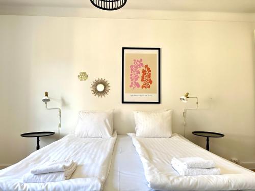 Postel nebo postele na pokoji v ubytování Stay Inn Söder Cozy apartment