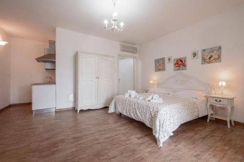 Ein Bett oder Betten in einem Zimmer der Unterkunft Albergo Pietriccio Rosso