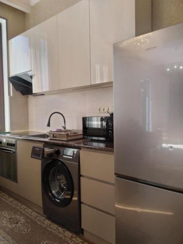 Η κουζίνα ή μικρή κουζίνα στο Apartment Cozy House 1