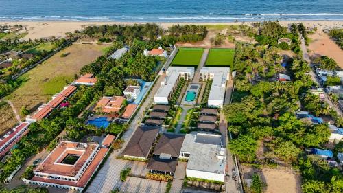 an aerial view of a house on the beach at The Shore Trishvam in Puducherry