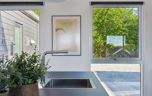 Un jardín fuera de Amazing Home In Sydals With Sauna