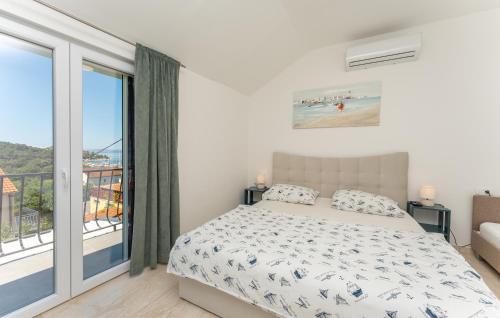 Ένα ή περισσότερα κρεβάτια σε δωμάτιο στο Holiday home Drage